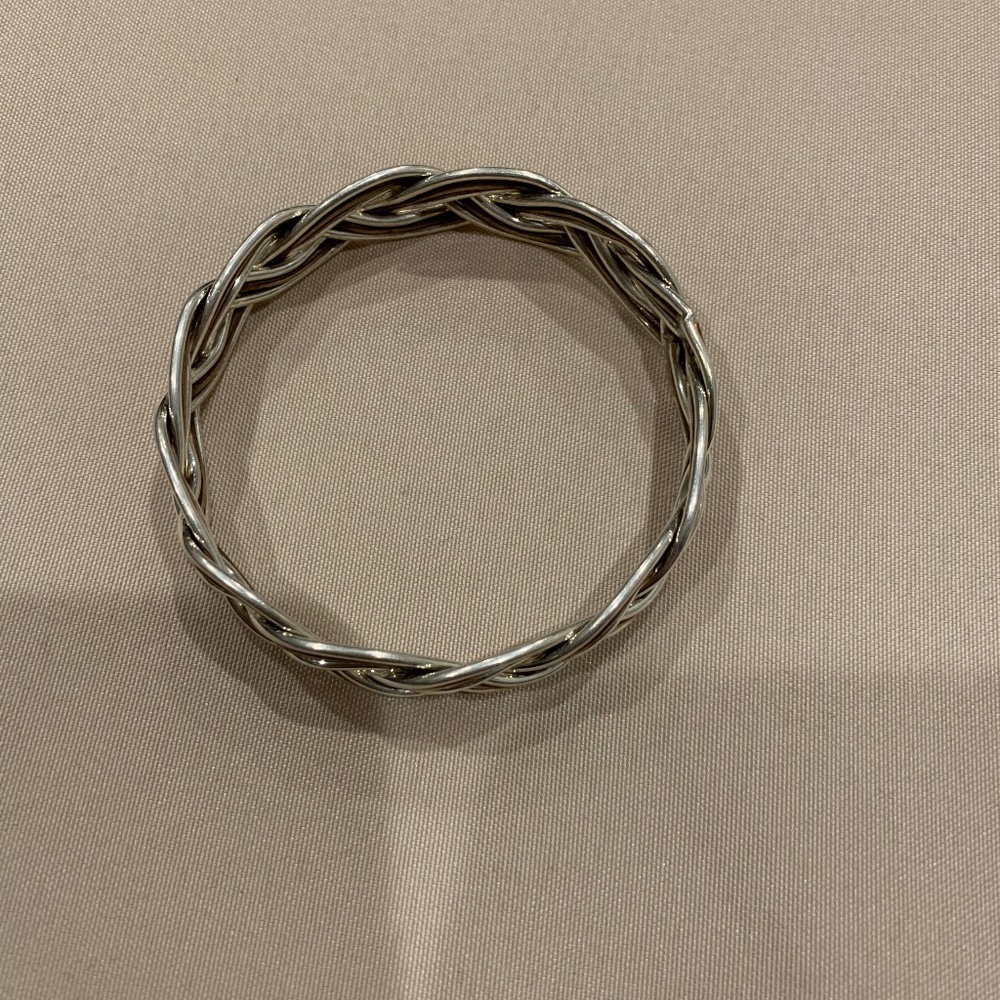 Silvertone and Bronzetone Braided Bangle Bracelet. Measures 2 5/8” Diameter